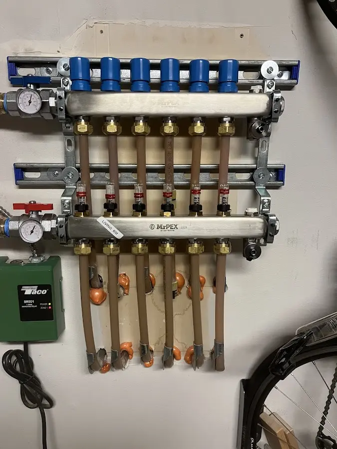 Plumber performing Water Heater Repair at a residential property in Lansdowne